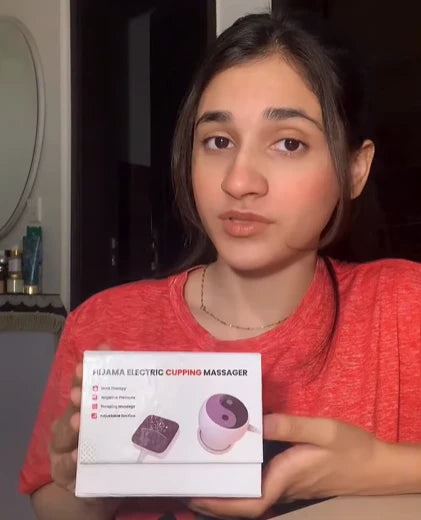 Person holding a box of a Electric Cupping Massager